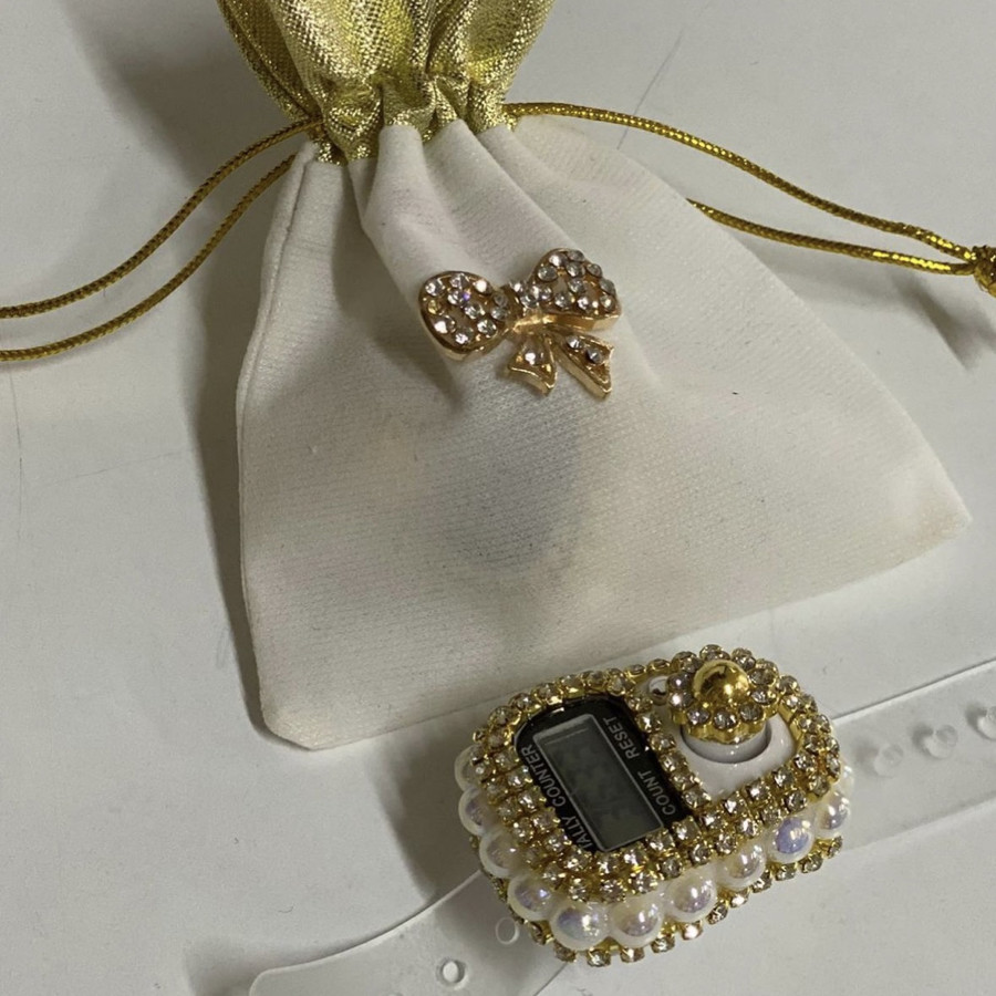 Kadife kese içerisinde taşlı zikirmatik krem renk